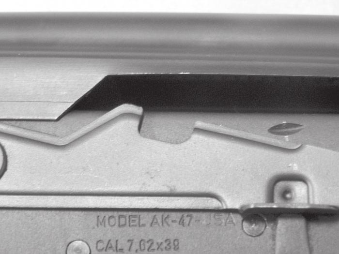 SEE FIG 29 Upper Receiver Release Latch Detente: Located on back left side of receiver. Round button that must first be depressed before latch is depressed.
