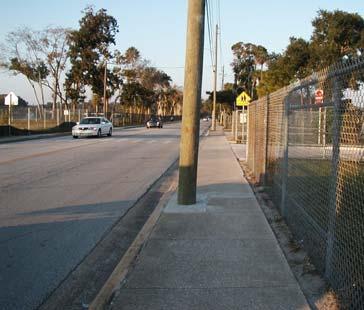 the car drop off entrance should remain at that location for student arrival and dismissal. Increase sidewalk width.