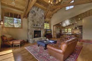 Sit back and relax in your own family lodge complete with a grand fireplace and
