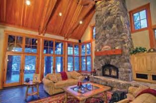craftsmanship, 3 fireplaces, towering wood crafted ceilings, a kitchen to die for