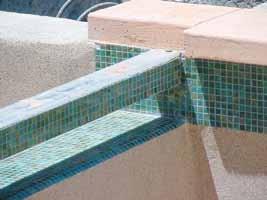 In some cases, the stainless steel beam can be finished with the same materials as the pool finish as shown below