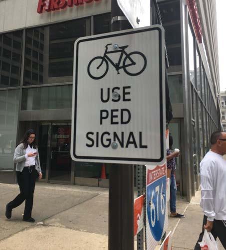 Signals bikes cross with peds