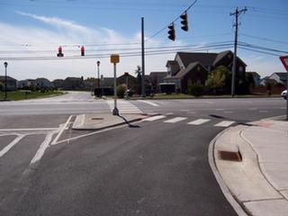 Rt.72 at Fieldstone Crossing: Bike lane striped around concrete