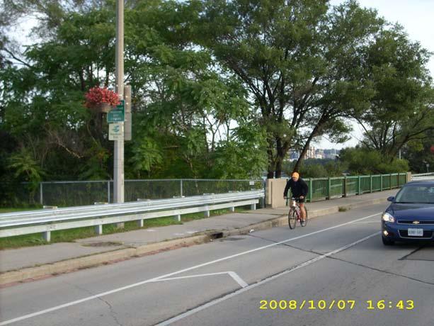 crossing the Niagara Escarpment in the centre of the city, and a multi-use trail along Upper James St. Example of a buffered bike lane in Hamilton.