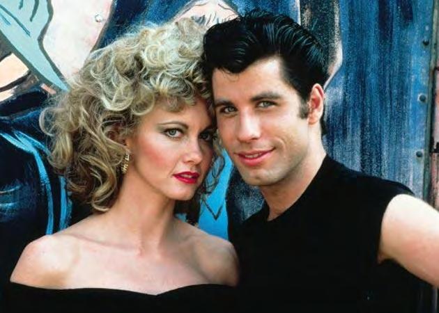 Background Grease (1978) During a visit to America, Australian Sandy meets Danny Zuko at the beach and falls in love.