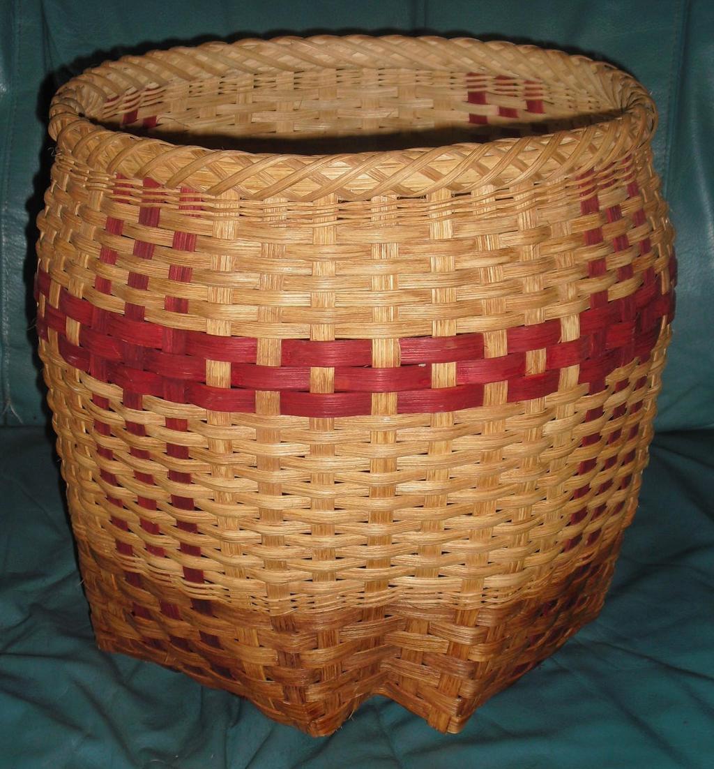 The basket will round to the top. An 8 strand braid lashing Crowns the rim creating a unique and interesting pattern. Hence the name: Cross and Crown Basket. This is an advanced-beginner level basket.