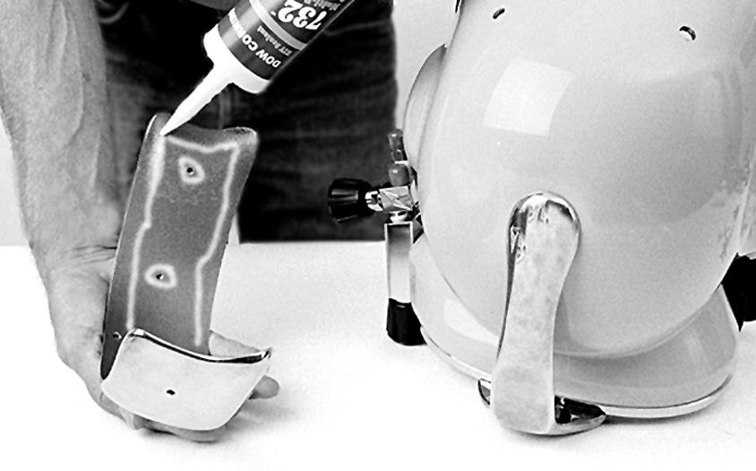 SuperLite 17B RTV (silicone sealant) is used to seal the weights to the helmet shell.