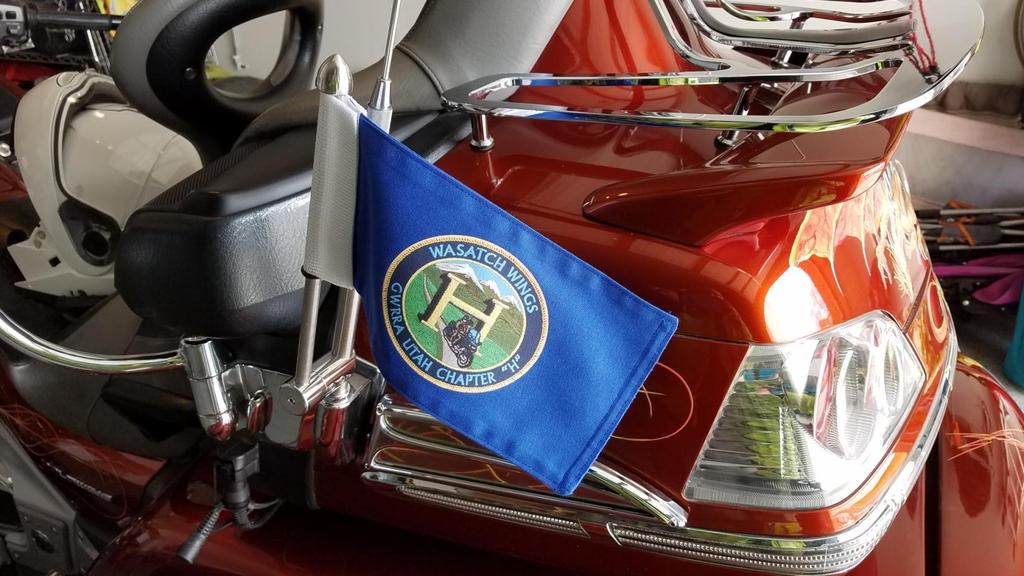 Larry Schaack, one of our Chapter H members, has worked with a flag manufacturer to produce a Chapter H flag sized to be flown on our bikes/trikes.