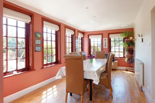 There is a large kitchen/dining room, which benefits from a number of windows to the front, side and
