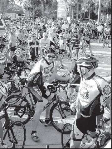 Page 5 of 6 SUN PHOTOS BY GREG MARTIN Riders get ready to embark