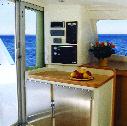 leopard 4O Available in 3 or 4-cabin layouts, the Leopard 40 s galley-up design incorporates a spacious saloon area with an L-shaped settee and an aft-facing galley with plenty of room to circulate.