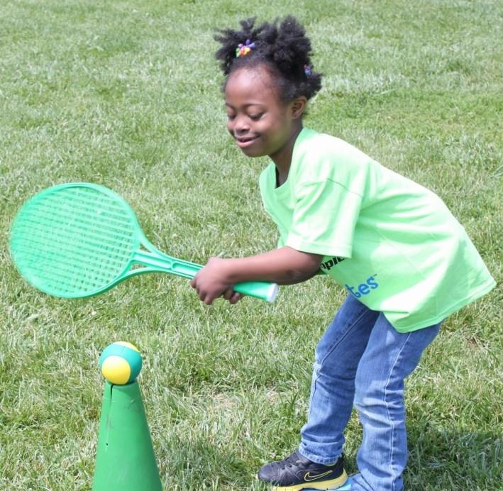 side striking beach ball, slow motion ball, paddle, junior size racket, plastic bat Using a sideways stance, encourage the child to strike a tossed