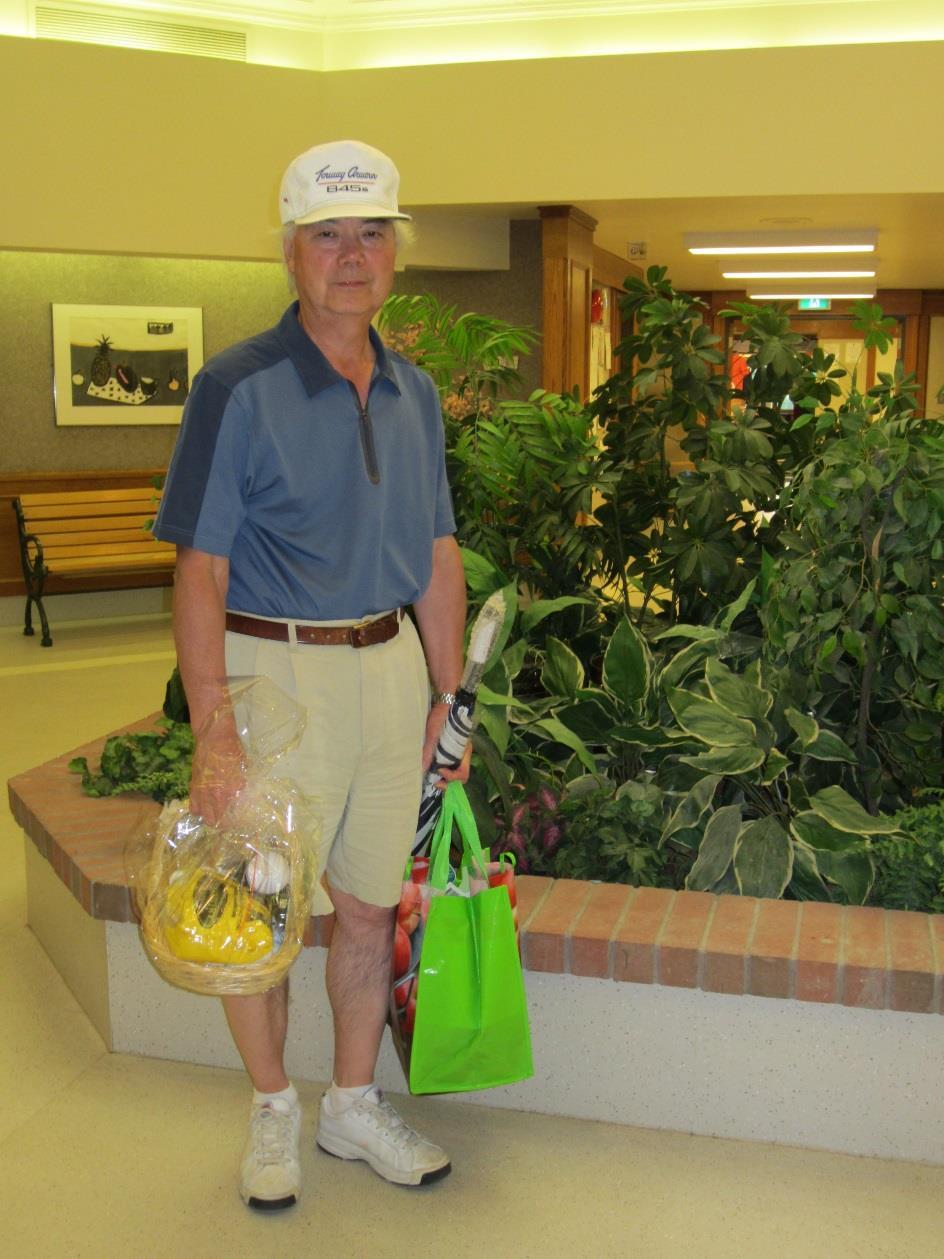 Ron has many reasons to look so relaxed: #1 he had a good golf game and won a prize #2