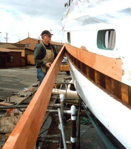 Master boat builder Jim Linderman checks the