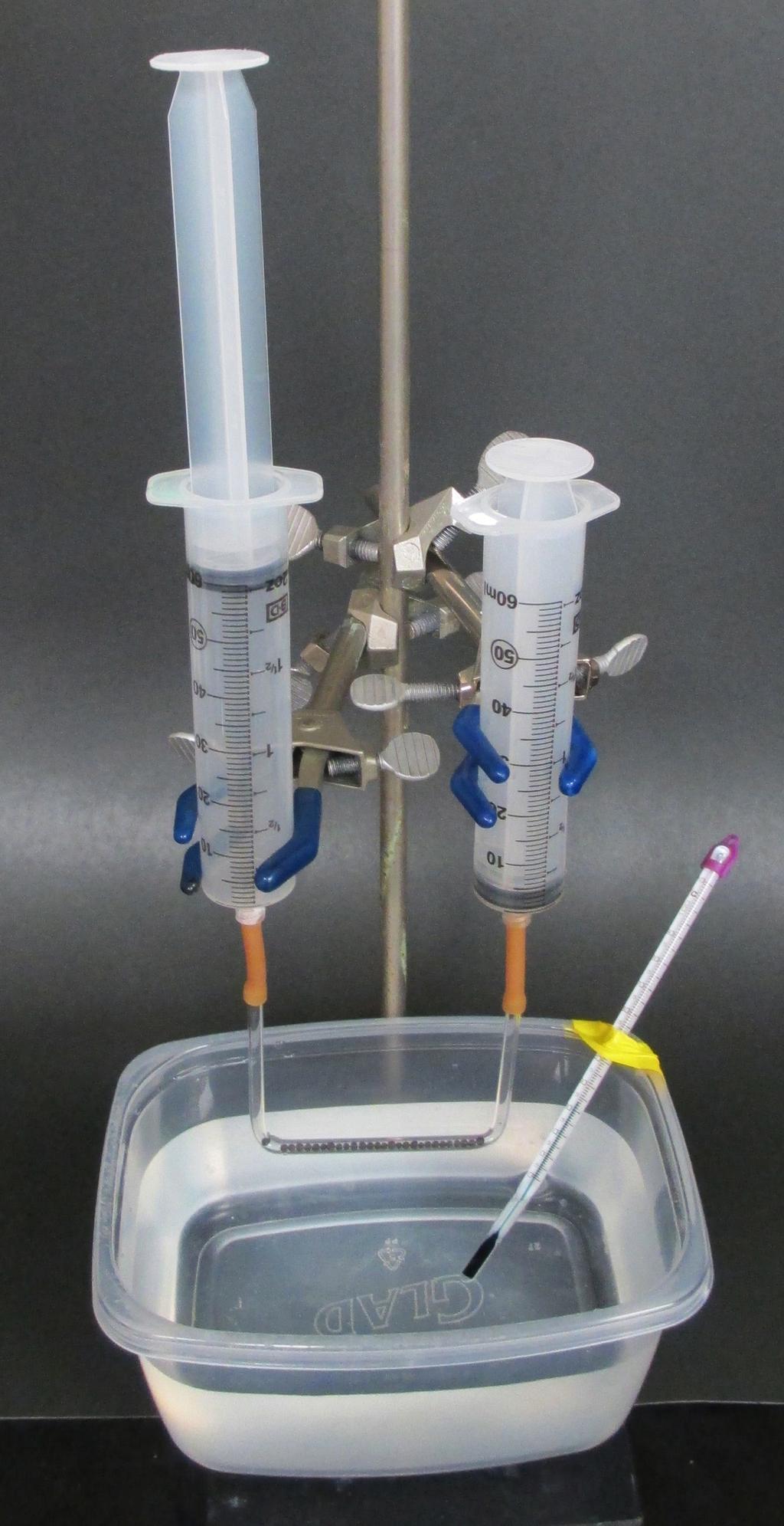 Construction and Use of the Gas Reaction Catalyst Tube** As shown in the figures, the experimental apparatus consists of a 60 ml syringe containing the gaseous reactants connected to a gas phase