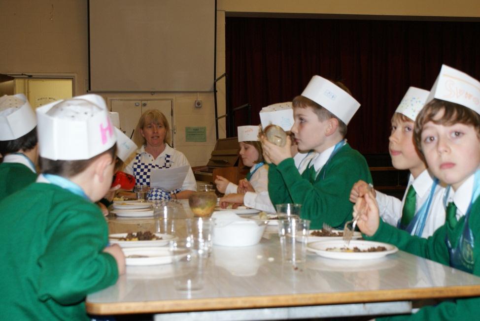 (Suzanne Whitcher and Sarah Dingle) The KS2 children enjoy a class each week given by Kitchen Capers, in their first class they learned about Indian food, tasting poppadums and dips, mixing spices