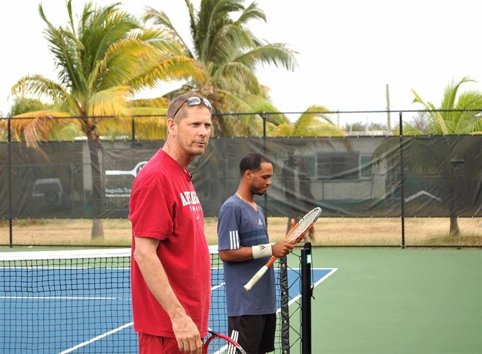 Article by Mr. Chris Ryall TENNIS ANYONE? Coach Robert Cox along with ATA coaches and kids at the Spring Camp- Robert Cox Clinic.