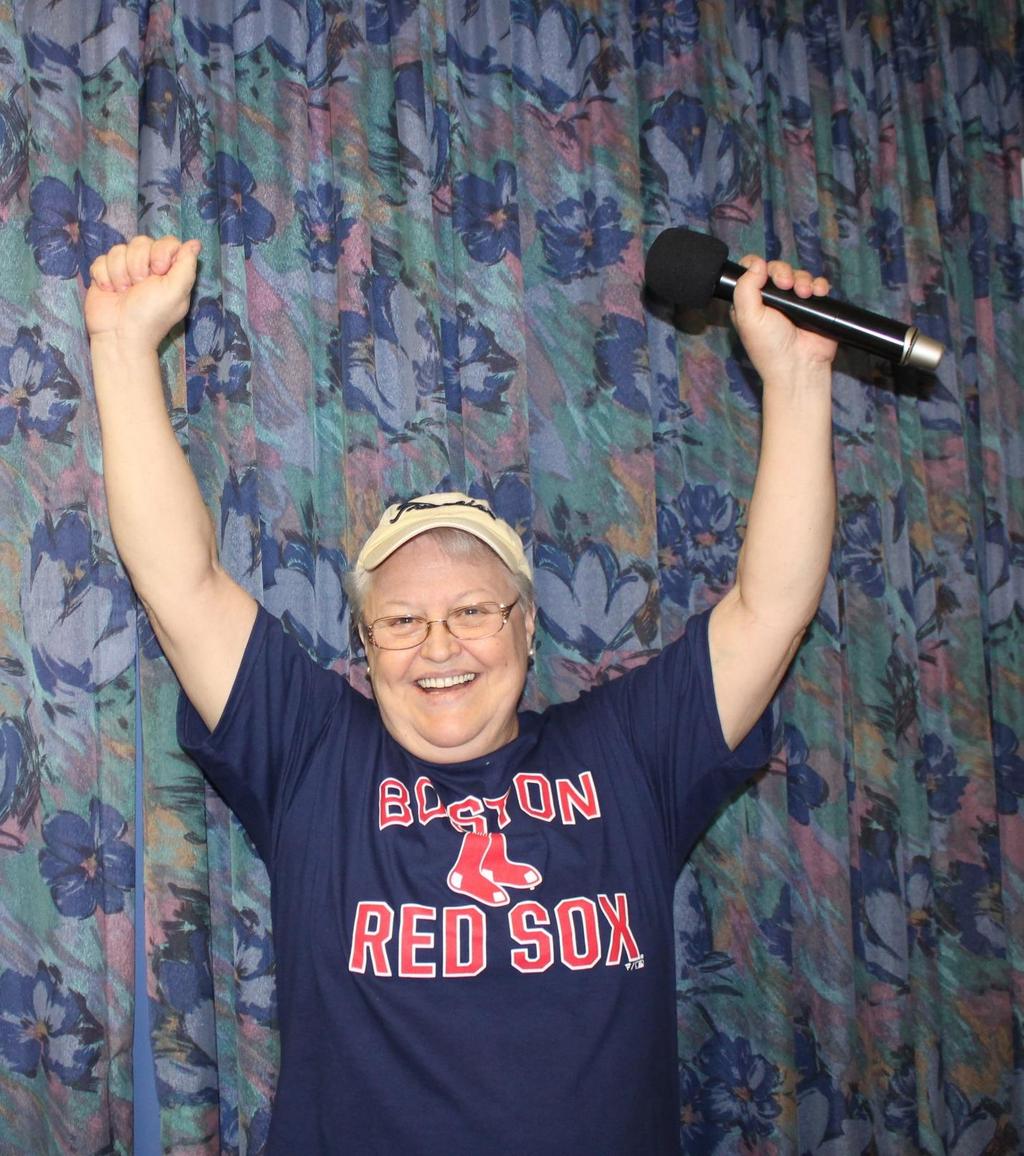 Judi Gearsbeck came on stage in her Red Sox garb even though she is a Yankee s fan.