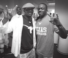 UT great Eric Metcalf with sophomore WR/KR Marquise Goodwin, both of whom are NCAA Champions in the long jump.