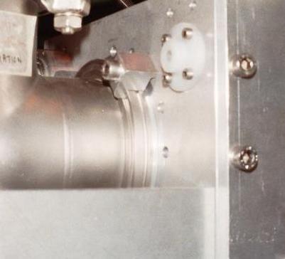 Figure 3: The upstream mounting of the target chamber. The beam goes from left to right. On the right side of the picture, you can see the side plates of the target chamber.