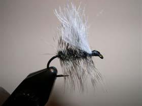 December Quick Ties with Tom Regina.Griffith s Gnat Hook Mustad 94840 or other standard dry fly hook size 16-24. Thread 8/0 black. Hackle Grizzly. Body Peacock herl. 1. Crush the hook barb and fix the hook in the vise.