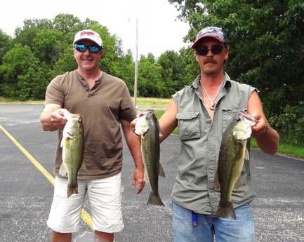 91 big bass of the weekend. The team caught their four keepers Sunday on four different baits - a 10.5 June Bug Mega worm, a crank bait, a big brush hog and a buzz bait. Their total weight was 12.