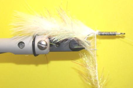 Jointed Minnow.Kent Regean Tie in small tuft of white marabou to cover articulating joint.