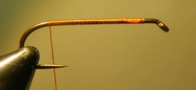 Attach the tying thread one eye length behind the eye of the hook (fig 2.