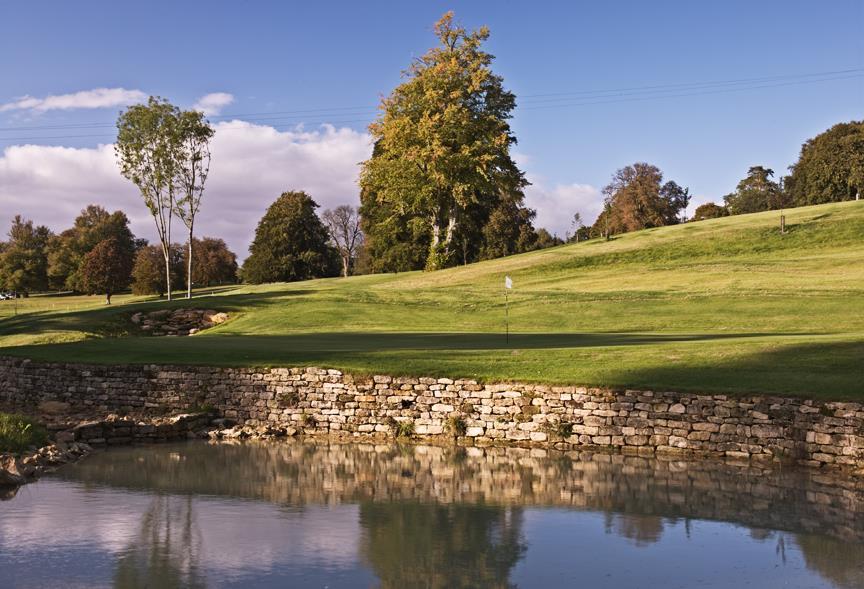 About the golf course The Bainbridge Championship Course at Heythrop Park was redesigned in 2009 by Tom MacKenzie the golf course architect responsible for many Open Championship venues, including