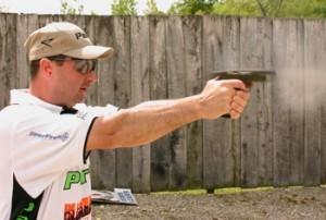 When Todd Jarrett is sweeping through his trigger pull, he keeps his arms fully extended to minimize recovery from arm flex.