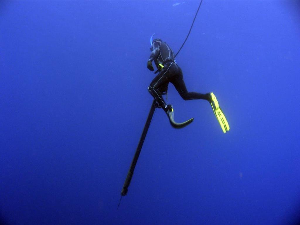SPEARFISHING Fishing with spear or speargun while