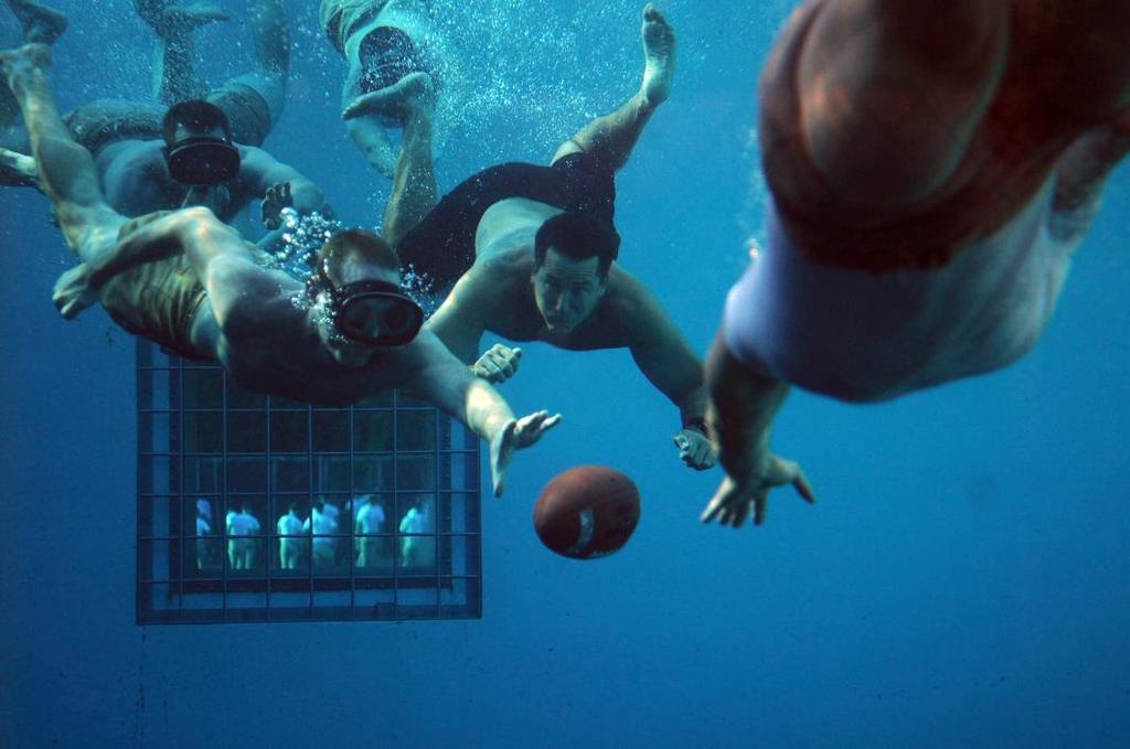 UNDERWATER FOOTBALL Underwater team sport Played in a pool with snorkeling equipment Slightly