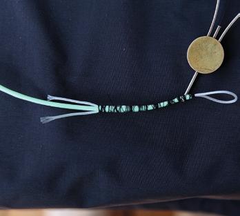 As the line has a monofilament core, there is no sensible and durable way of making the loop from the core.