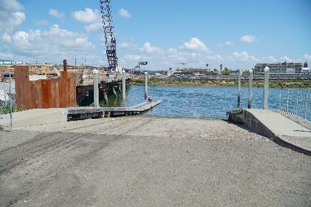 low-freeboard dock connected to a wide ADA gangway; and, 2) A boat launch ramp with boarding pier to a high-freeboard dock.