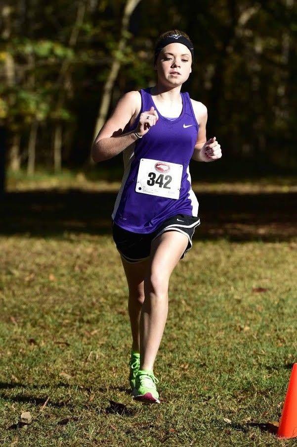 CYCLONE CONNECTION * February 2017 Credit: Picture and article run in the Wilson Times Junior, Morgan Lane, of Community Christian School Cyclones leads entire race for her first NCISAA 1A XC State