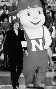 Nebraska Continues to Grow Thriving Tradition By Mike Babcock During a ceremony at halftime of a victory against Iowa State at the Bob Devaney Sports Center in January of 1995, Karen Jennings' No.