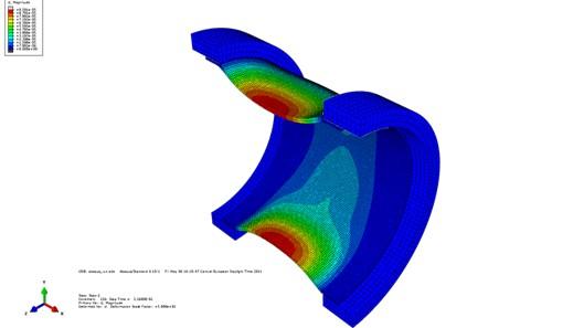 Fig. 11: Solid Abaqus model. U displacement contours with a maximum value of 1e-04. upper chamber, one in the lower chamber and the last point is located in the center of the compensation chamber.