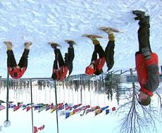 Standing Straddle Stretch Spread feet shoulder width apart, with or without snowshoes on Bend