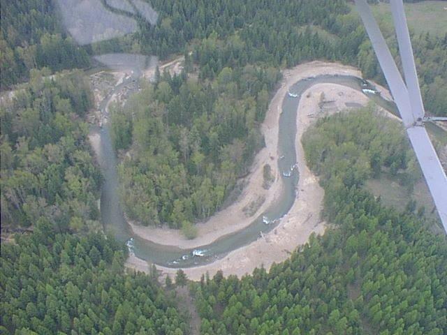 Aerial view shows the creek no longer flows directly into the bank (area circled).