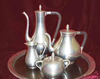 creamer and sugar dish. It also includes a lovely four piece goblet set.