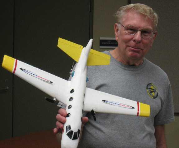 50 toy foam plane that has been converted to twin electric power using some GWS motors.