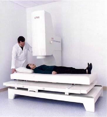 The CMI-2409 system consists of a holder (A), a patient bed (B) and a workstation (not shown in the picture below).