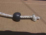 Connect the shackle on the boom outhaul line to the grommet in
