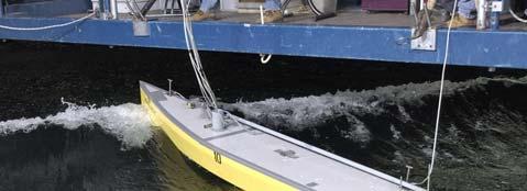 The rudders, placed aft and underneath the hull, generate a lift force to port and so a counter balancing yawing moment to