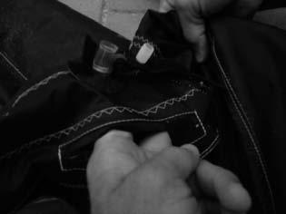 4. Reach into the zipper opening and ensure that the bladder is properly in place and filling all the space at the front of the strut.