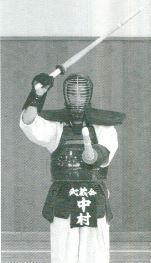 and the Tsuba is in front, etc. 7) Stand straight up in Taitō posture.