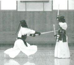 However, in Nitō Jōdan Kamae, the Tsuka length is six cm shorter; therefore, your MaAi is closer to your opponent; so, sometimes, this method does not work as in Fig. 63c.