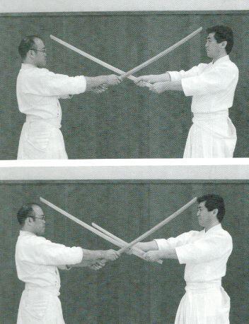 71a for Shō Jōgetachi, and as in Fig. 71b for Gyaku Jōgetachi. Take the Daitō to your hip and keep the Kensen aiming at opponent s throat.