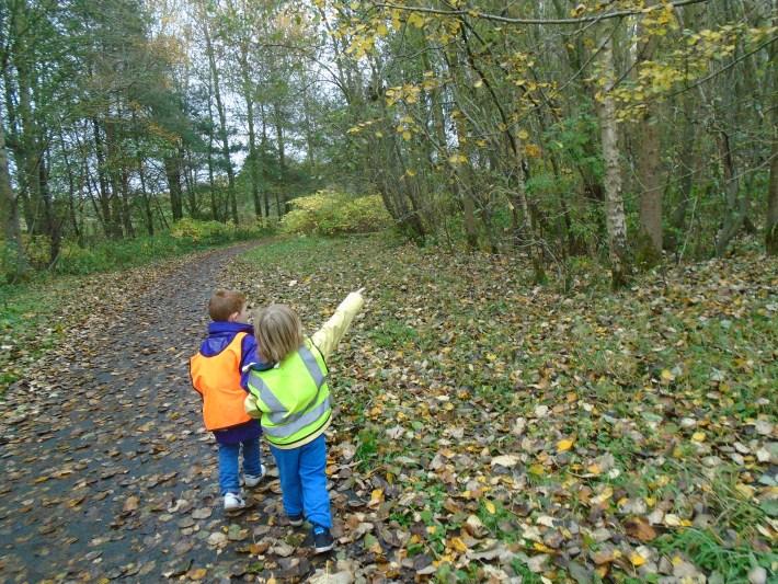 In our local community Collecting different Autumn materials to bring back to nursery for