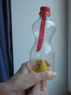 Cut the neck of another balloon and place it over the open end of the bottle. 4. Pull on the middle of this piece of rubber. What happens to the balloon? 5.